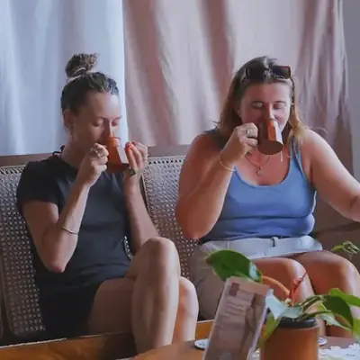 Guests enjoying tea after a massage at Praanadha