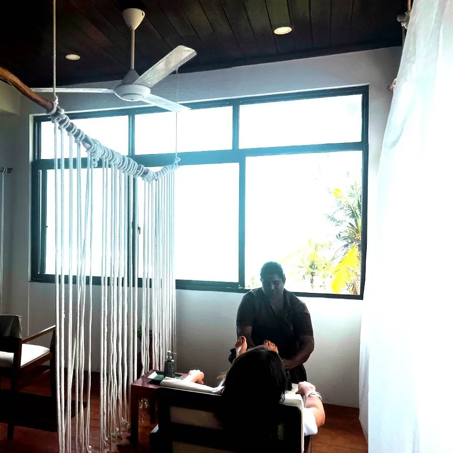 Foot massage by the sea at Praanadha Ayurveda Wellness