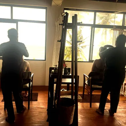 Ocean-facing treatment room at Praanadha Ayurveda Wellness